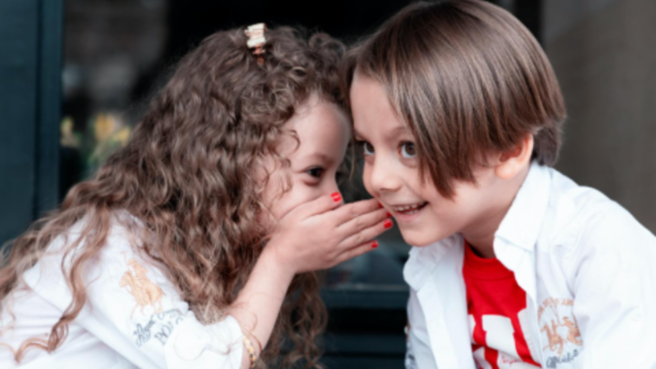 Child practicing early literacy skills at home through imitation and speech practice Parent modeling language to support early literacy skills at home Speech-language pathologist helping a child develop early literacy skills at home